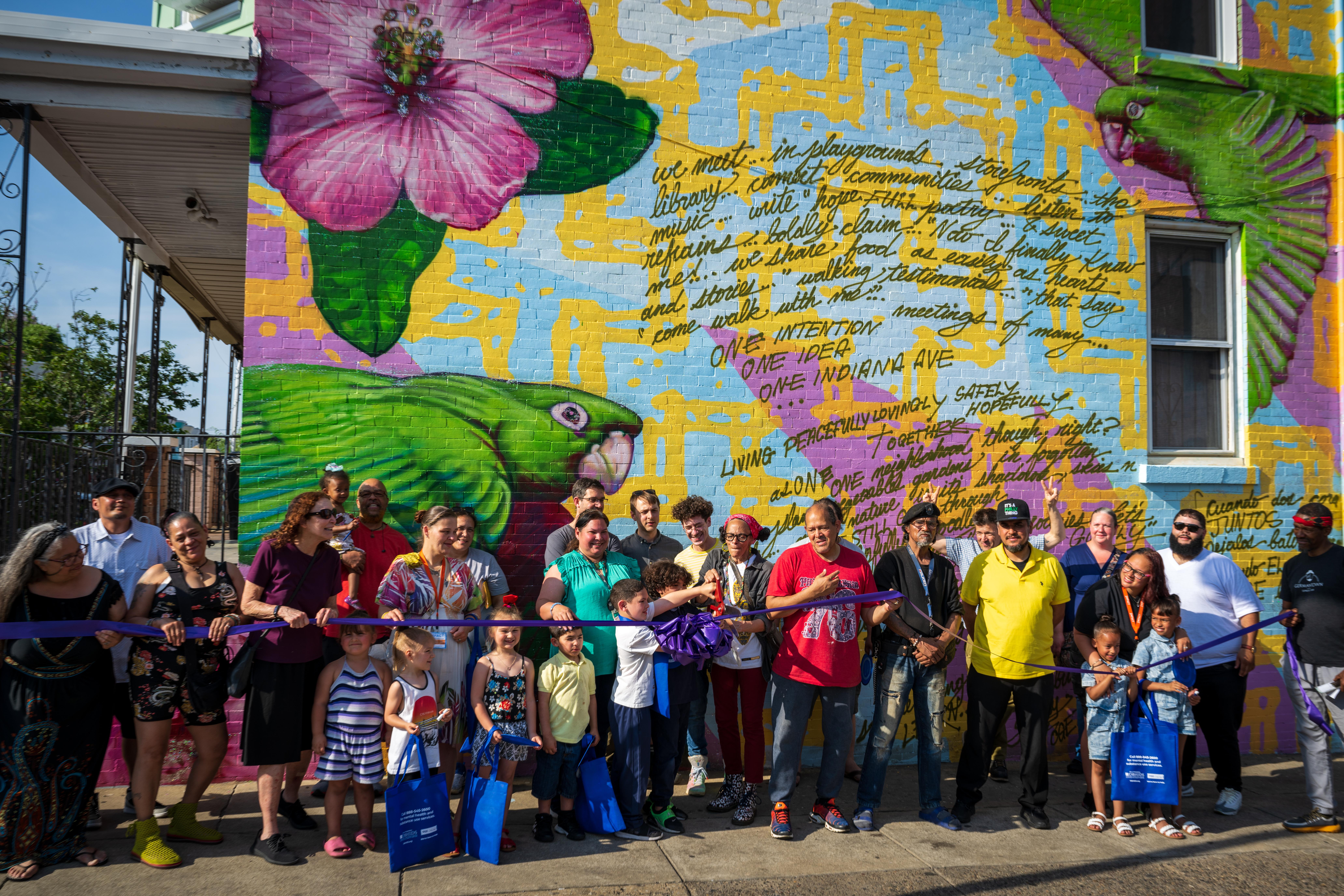 mural photo ribbon cutting
