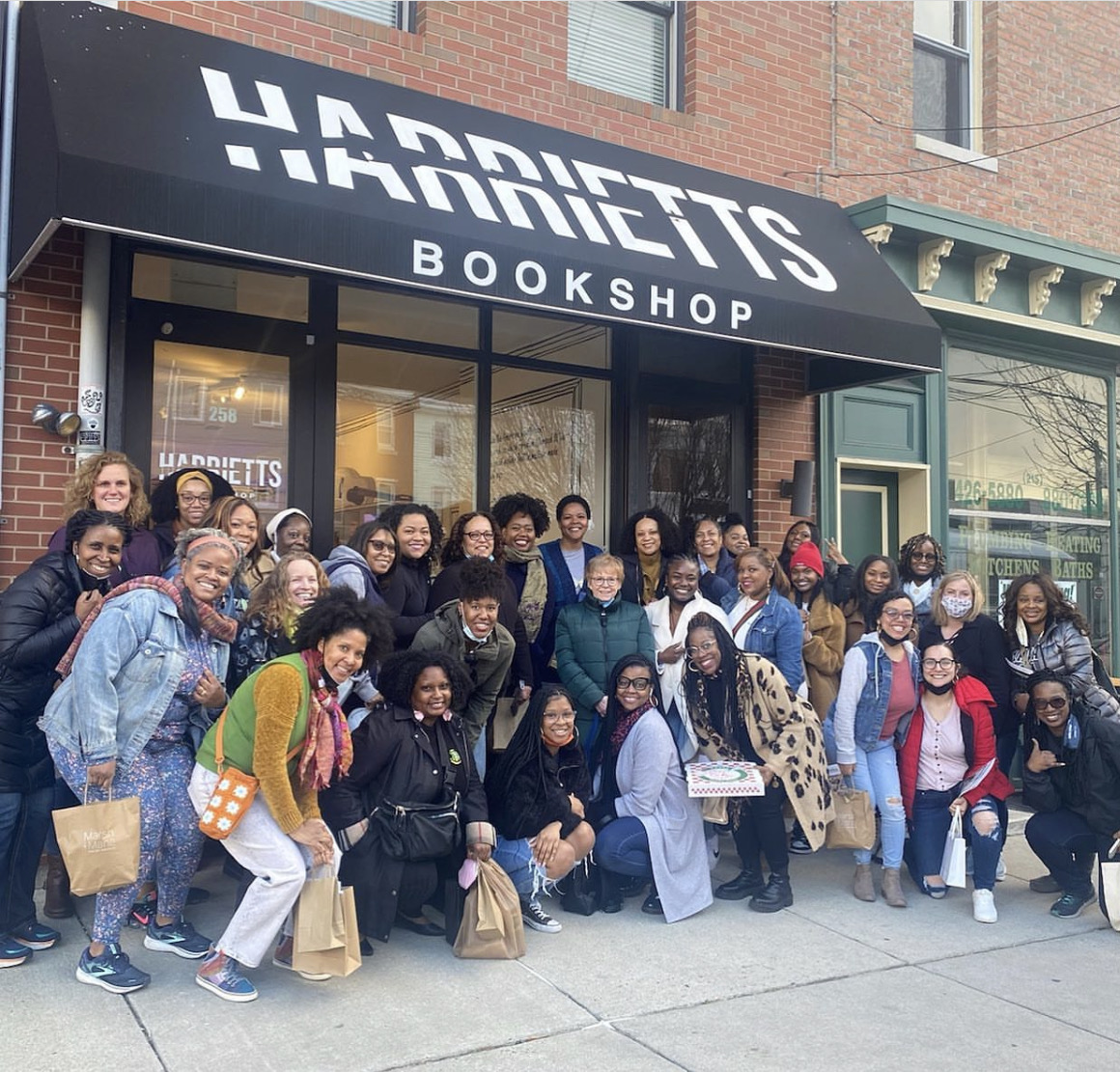 community photo outside of Harriett's