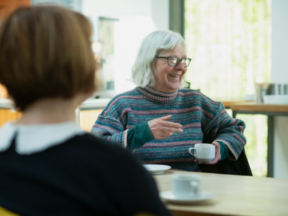 Two women having a discussion.
