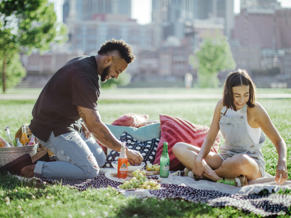 Twp people having a picnic.
